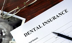 a closeup of a dental insurance form